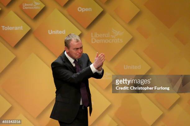 Liberal Democrats party leader Tim Farron delivers his keynote speech to party members on the last day of the Liberal Democrats spring conference at...