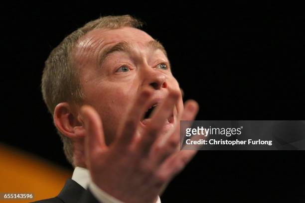 Liberal Democrats party leader Tim Farron delivers his keynote speech to party members on the last day of the Liberal Democrats spring conference at...