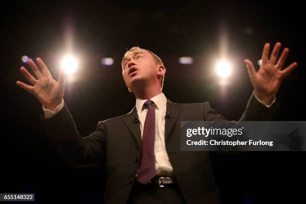 Liberal Democrats party leader, Tim Farron delivers his keynote speech to party members on the last day of the Liberal Democrats spring conference at...