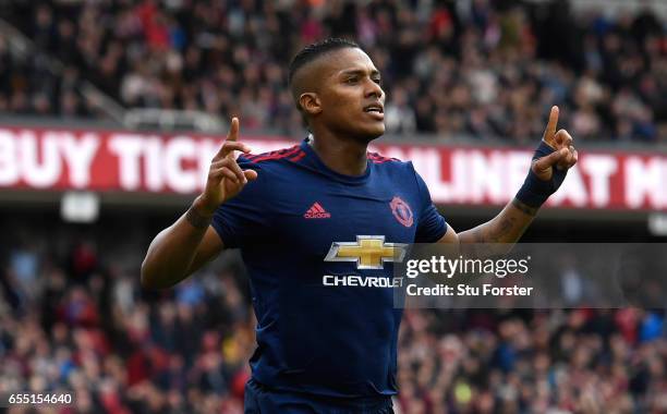 Antonio Valencia of Manchester United celebrates scoring his sides third goal during the Premier League match between Middlesbrough and Manchester...