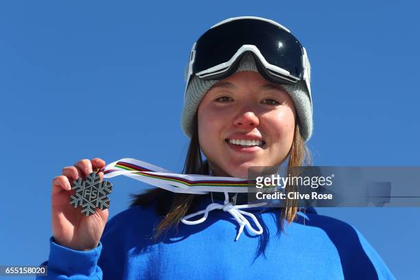 Bronze medalist Isabel Atkin of Great Britain poses during the medal cermony for the Women's Slopestyle final on day twelve of the FIS Freestyle Ski...