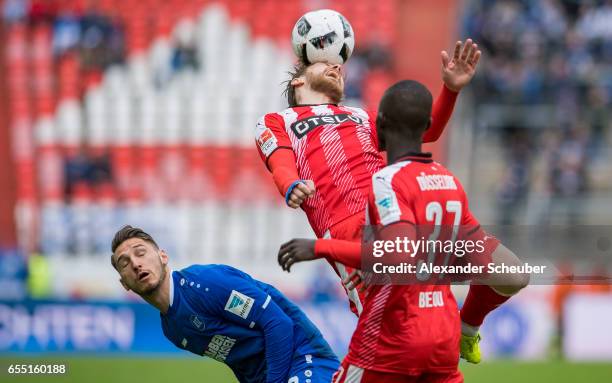 Dimitrios Diamantakos of Karlsruhe challenges Adam Bodzek of Fortuna Duesseldorf during the Second Bundesliga match between Karlsruher SC and Fortuna...