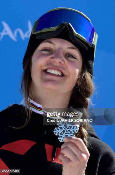 Silver medal winner Swedish freestyler Emma Dahlstrom celebrates on the podium of the women's SlopeStyle at the FIS Snowboard and Freestyle Ski World...