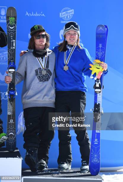 Bronze medalists James Woods of Great Britain and Isabel Atkin of Great Britain pose during the medal cermony for the Slopestyle finals on day twelve...