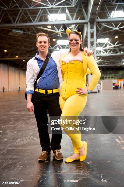 Cosplay couple in character as Ash Ketchum and Pikachu during the MCM Birmingham Comic Con at NEC Arena on March 19, 2017 in Birmingham, England.