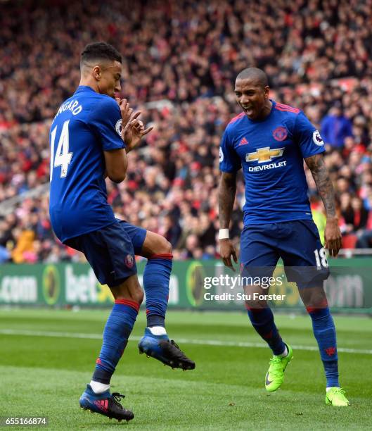 Jesse Lingard of Manchester United celebrates scoring his sides second goal with Ashley Young of Manchester United during the Premier League match...
