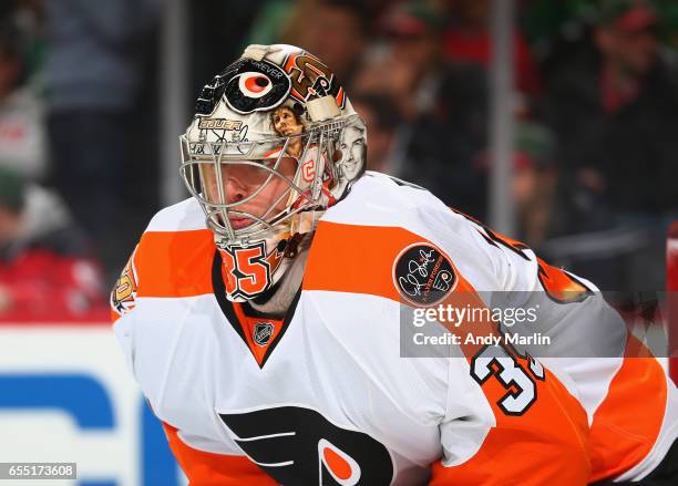 Steve Mason of the Philadelphia Flyers looks on against the New Jersey Devils during the game at Prudential Center on March 16, 2017 in Newark, New...