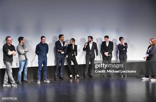 Writers Paul Wernick and Rhett Reese, Director Daniel Espinosa, actors Ryan Reynolds, Rebecca Ferguson and Jake Gyllenhaal, producers David Ellison...