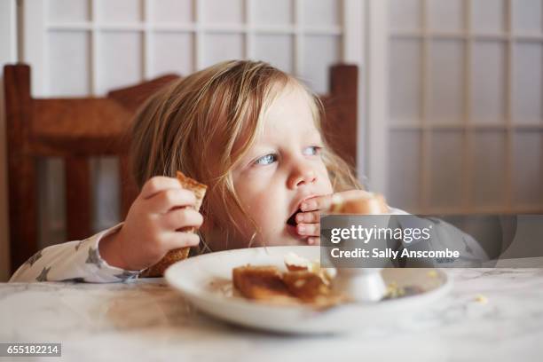 child eating breakfast - hard boiled eggs stock pictures, royalty-free photos & images