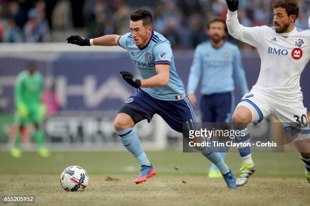 March 18: Jack Harrison of New York City FC goes past Hernan Bernardello of Montreal Impact in action during the New York City FC Vs Montreal Impact...
