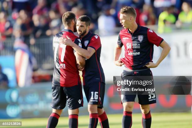 Paolo Faragò, Panagiotis Tachtsidis and Bartosz Salamon at the end of the Serie A match between Cagliari Calcio and SS Lazio at Stadio Sant'Elia on...