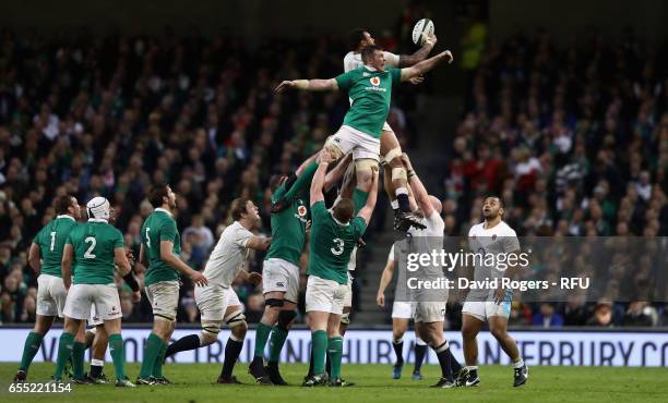 Courtney Lawes of England wins a lineout from Peter O'Mahony during the RBS Six Nations match between Ireland and England at the Aviva Stadium on...