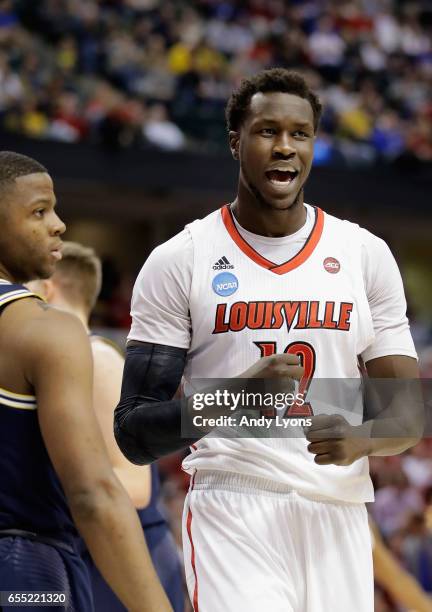Mangok Mathiang of the Louisville Cardinals reacts against the Michigan Wolverines in the first half during the second round of the 2017 NCAA Men's...