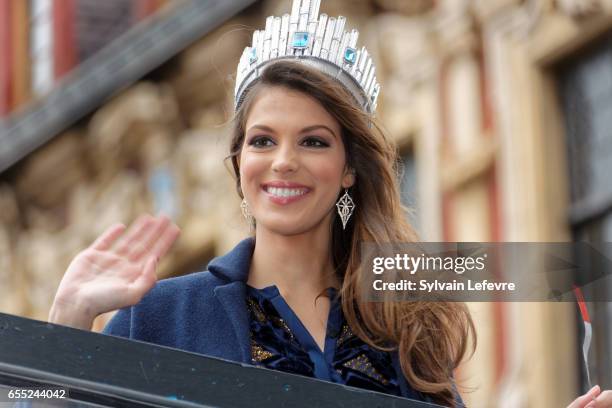 Miss Universe 2017 and Miss France 2016, Universe Mittenaere salutes the crowd on the top upon her arrival to visit Lille, her hometown, on March 19,...