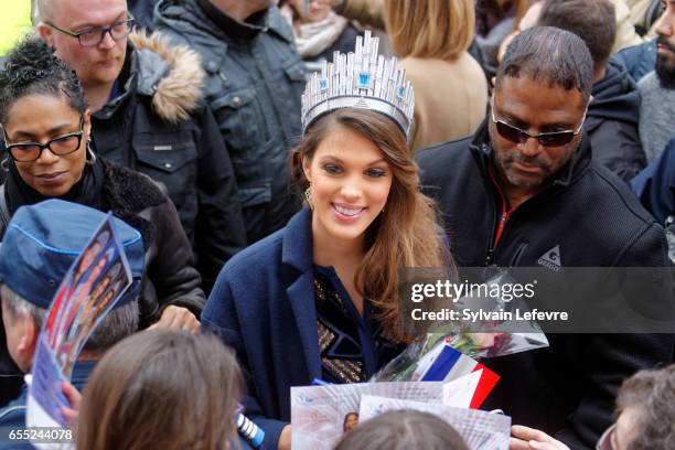 Miss Universe 2017 and Miss France 2016, Universe Mittenaere autographs upon her arrival to visit Lille, her hometown, on March 19, 2017 in Lille,...