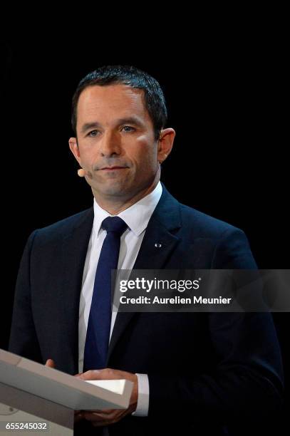 French Socialist candidate for the Presidential Election, Benoit Hamon addresses voters during a political meeting at AccorHotels Arena on March 19,...