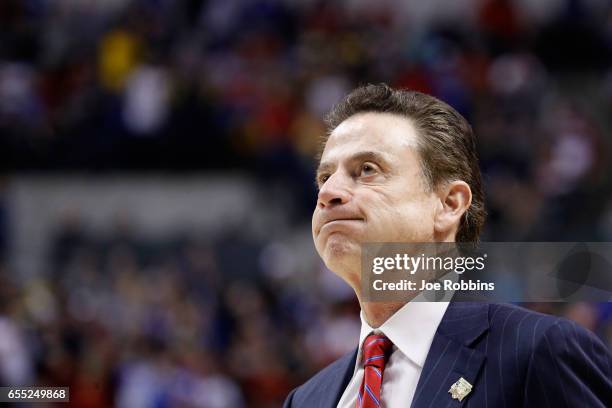 Head coach Rick Pitino of the Louisville Cardinals reacts to their 69-73 loss to the Michigan Wolverines during the second round of the 2017 NCAA...