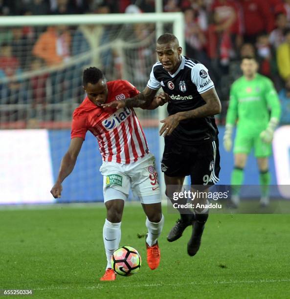 Talisca of Besiktas in action against Mbilla of Antalyaspor during the Turkish Spor Toto Super Lig football match between Antalyaspor and Besiktas at...