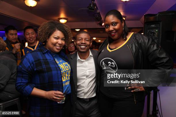 Golden State Warriors legend Muggsy Bogues poses for a photo with fans at the third American Express "All for Dub Nation" Watch Party on the S.S. Dub...