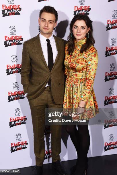 Douglas Booth and Aisling Bea pose in the winners room at the THREE Empire awards at The Roundhouse on March 19, 2017 in London, England.