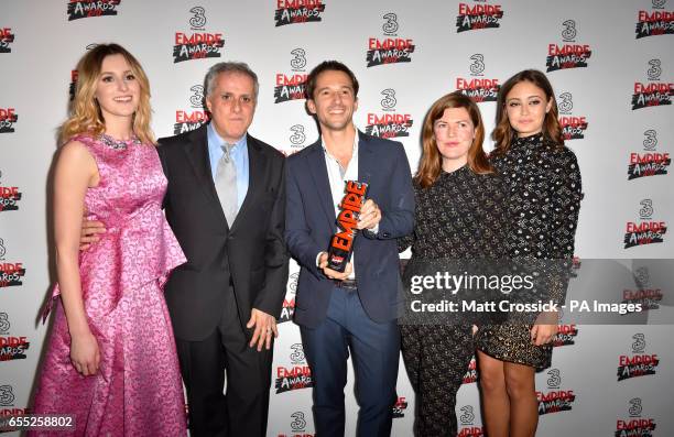 Producer Simon Halfon, Director Matt Whitecross and Producer Fiona Nielson with the award for Best Documentary for Supersonic in the winners room...