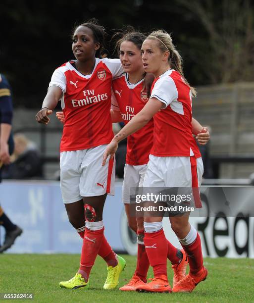 Danielle van de Donk celebrates scoring a goal for Arsenal with Danielle Carter and Jordan Nobbs during the match between Arsenal Ladies and...