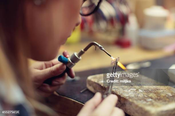 jewelry manufacture - melting gold stock pictures, royalty-free photos & images