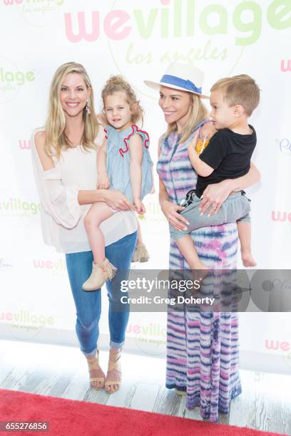 Abigail Ochse and daughter Willow and Julie Solomon and son Camden attend the Grand Opening Party For WeVillage at WeVillage on March 18, 2017 in Los...