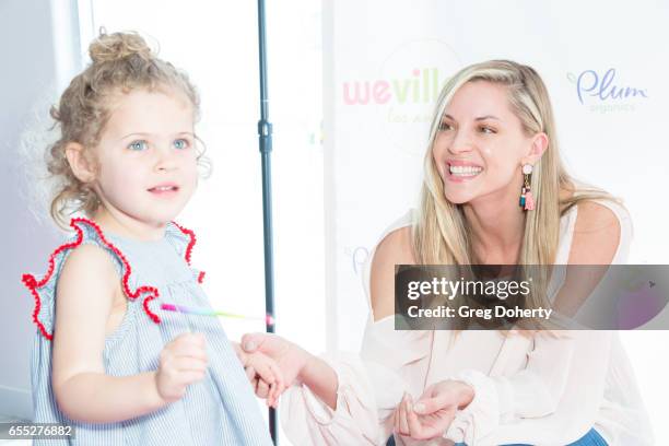 Abigail Ochse and daughter Willow attend the Grand Opening Party For WeVillage at WeVillage on March 18, 2017 in Los Angeles, California.