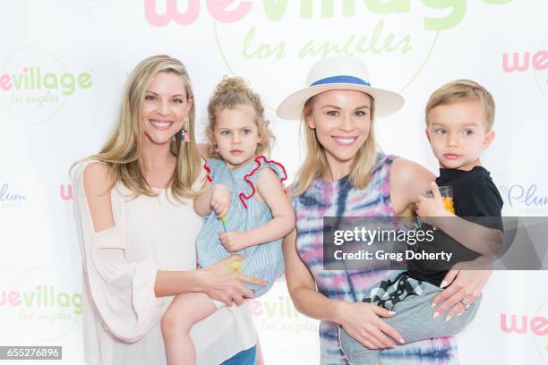 Abigail Ochse and daughter Willow and Julie Solomon and son Camden attend the Grand Opening Party For WeVillage at WeVillage on March 18, 2017 in Los...