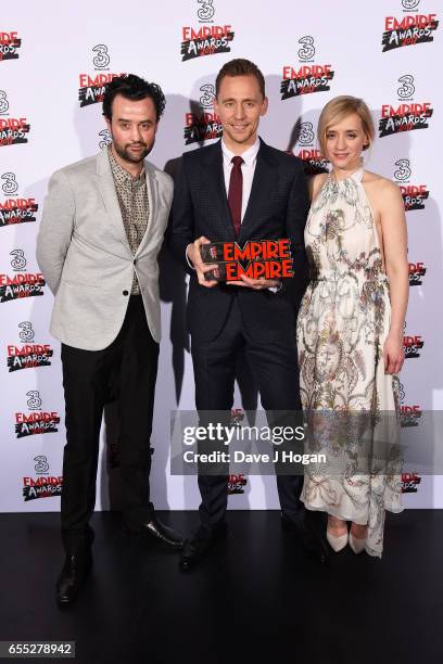 Daniel Mays, Tom Hiddleston and Anne-Marie Duff pose with the awards for Empire Hero and Best TV Series - The Night Manager in the winners room at...