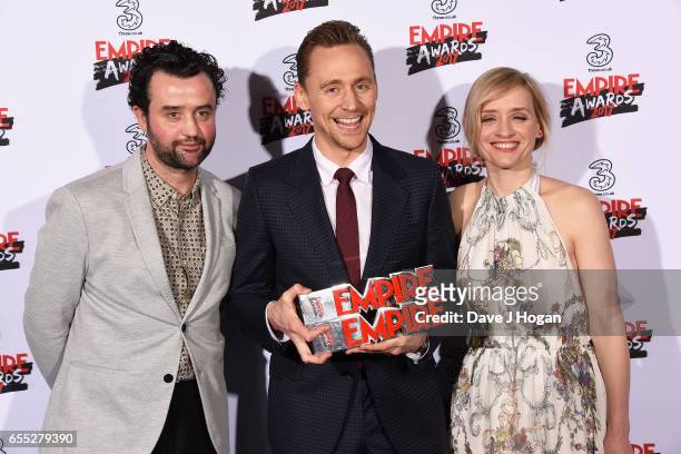 Daniel Mays, Tom Hiddleston and Anne-Marie Duff pose with the awards for Empire Hero and Best TV Series - The Night Manager in the winners room at...
