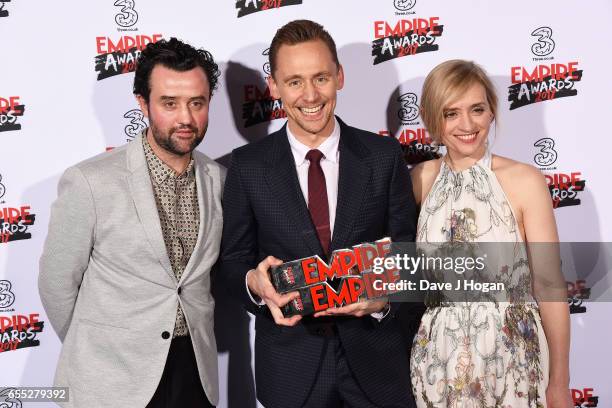 Daniel Mays, Tom Hiddleston and Anne-Marie Duff pose with the awards for Empire Hero and Best TV Series - The Night Manager in the winners room at...