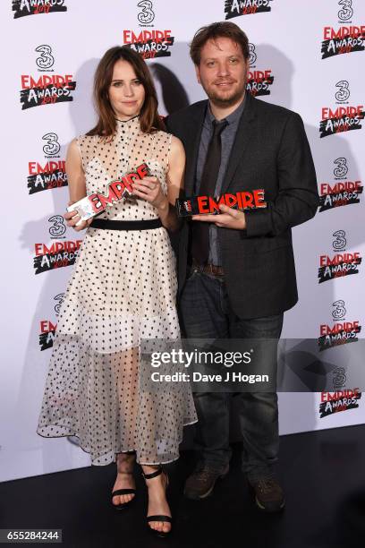 Felicity Jones and director Gareth Edwards pose with the awards for Best Actress and Best Director for Rogue One: A Star Wars Story in the winners...