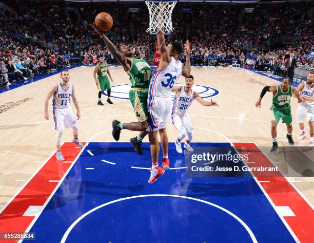 Gerald Henderson of the Boston Celtics goes up for the layup against the Philadelphia 76ers at Wells Fargo Center on March 19, 2017 in Philadelphia,...