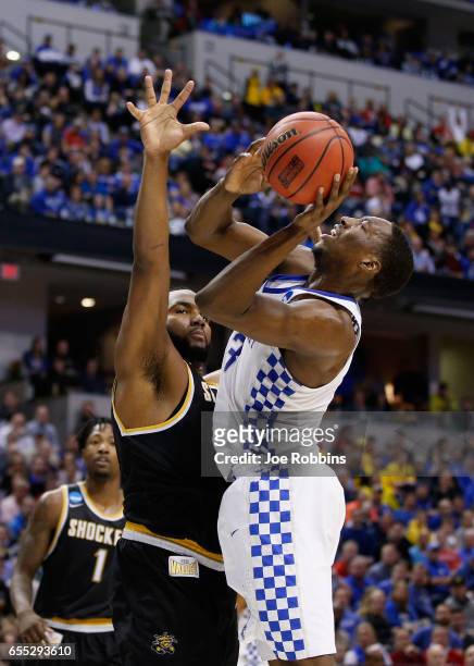 Shaquille Morris of the Wichita State Shockers defends Edrice Adebayo of the Kentucky Wildcats in the first half during the second round of the 2017...