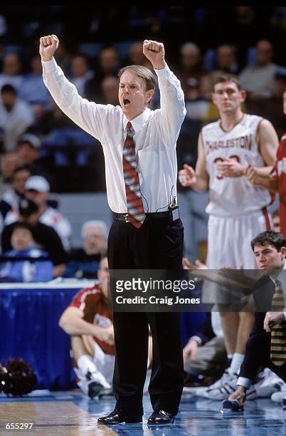 Head Caoch John Kresse of the Charleston Cougars motions on the sidelines during the game against the Richmond Spiders at the Charlotte Coliseum in...