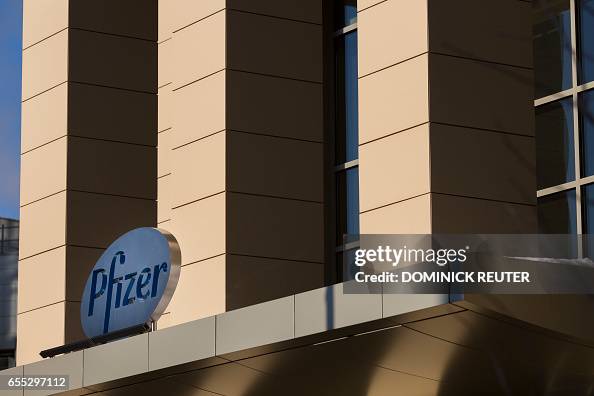 Pfizer Building Sign A sign for Pfizer pharmaceutical company is seen on a building in ...