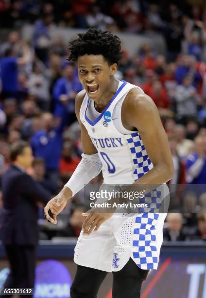 De'Aaron Fox of the Kentucky Wildcats celebrates his dunk against the Wichita State Shockers in the second half during the second round of the 2017...