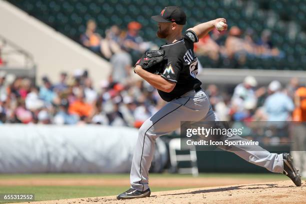 Dan Straily of the Marlins delivers a pitch to the plate during the spring training game between the Miami Marlins and the Detroit Tigers on March...