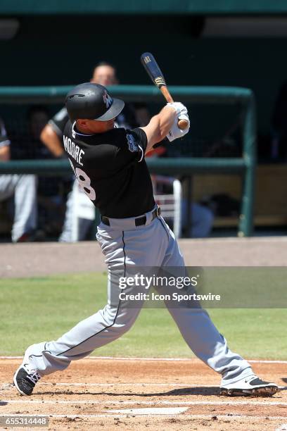 Tyler Moore of the Marlins at bat during the spring training game between the Miami Marlins and the Detroit Tigers on March 18, 2017 at Joker...