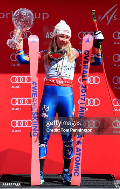 Mikaela Shiffrin of United States celebrates with the globe for being awarded the overall season ladies' champion at the 2017 Audi FIS Ski World Cup...