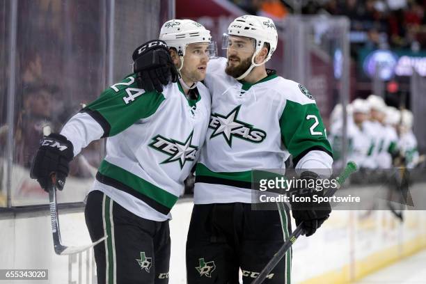 Texas Stars LW Brandon DeFazio and Texas Stars D Nick Ebert celebrate after DeFazio scored a goal during the first period of the AHL hockey game...