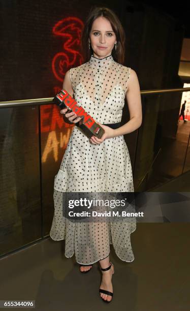 Felicity Jones poses in the winners room at the THREE Empire awards at The Roundhouse on March 19, 2017 in London, England.