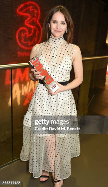 Felicity Jones poses in the winners room at the THREE Empire awards at The Roundhouse on March 19, 2017 in London, England.
