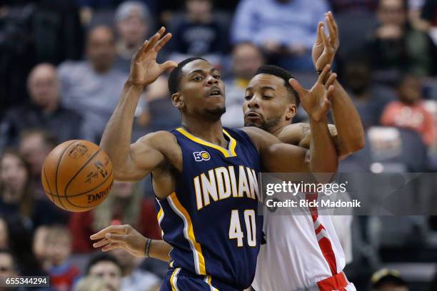 Toronto Raptors guard Norman Powell disrupts the play of Indiana Pacers guard Glenn Robinson III . Toronto Raptors vs Indiana Pacers in 1st half...