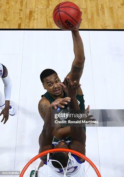 Eron Harris of the Michigan State Spartans takes a shot against the Kansas Jayhawks during the second round of the 2017 NCAA Men's Basketball...