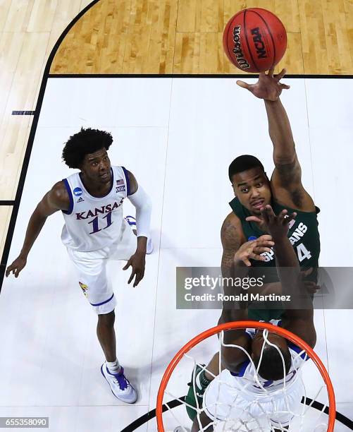 Eron Harris of the Michigan State Spartans takes a shot against the Kansas Jayhawks during the second round of the 2017 NCAA Men's Basketball...