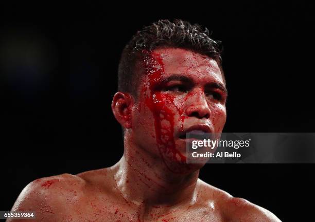 Roman "Chocolatito" Gonzalez is cut against Srisaket Sor Rungvisai during their Championship fight for Gonzalez's WBC junior bantamweight title at...