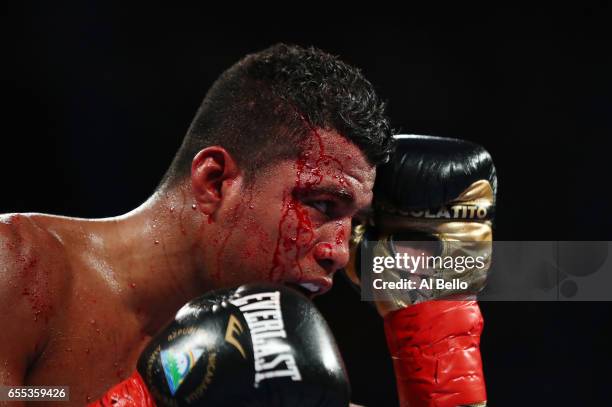 Roman "Chocolatito" Gonzalez is cut against Srisaket Sor Rungvisai during their Championship fight for Gonzalez's WBC junior bantamweight title at...